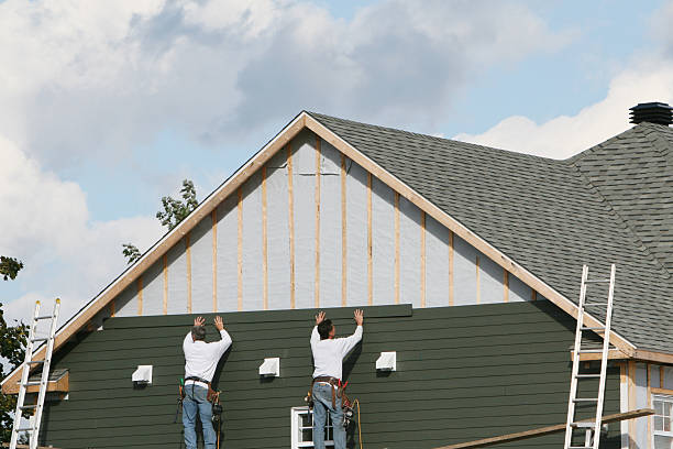 Professional Siding Installation technician working in Midland, NC